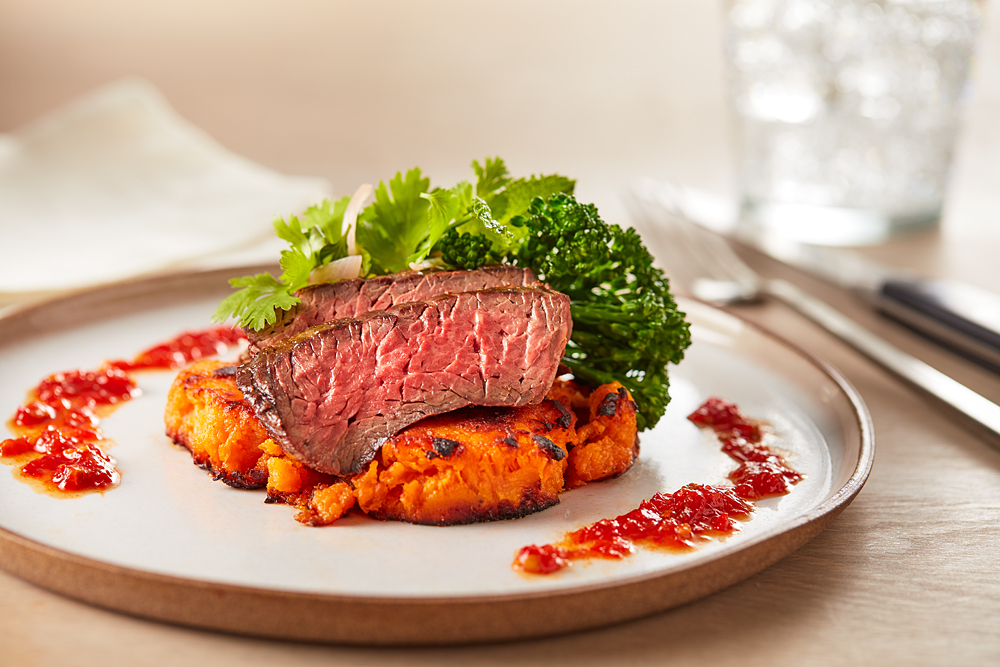 Harissa & honey glazed Aussie grassfed beef with broccoli rabe and smashed sweet potato