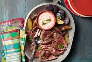 Roasted leg of lamb with sriracha and kimchi-mint sour cream