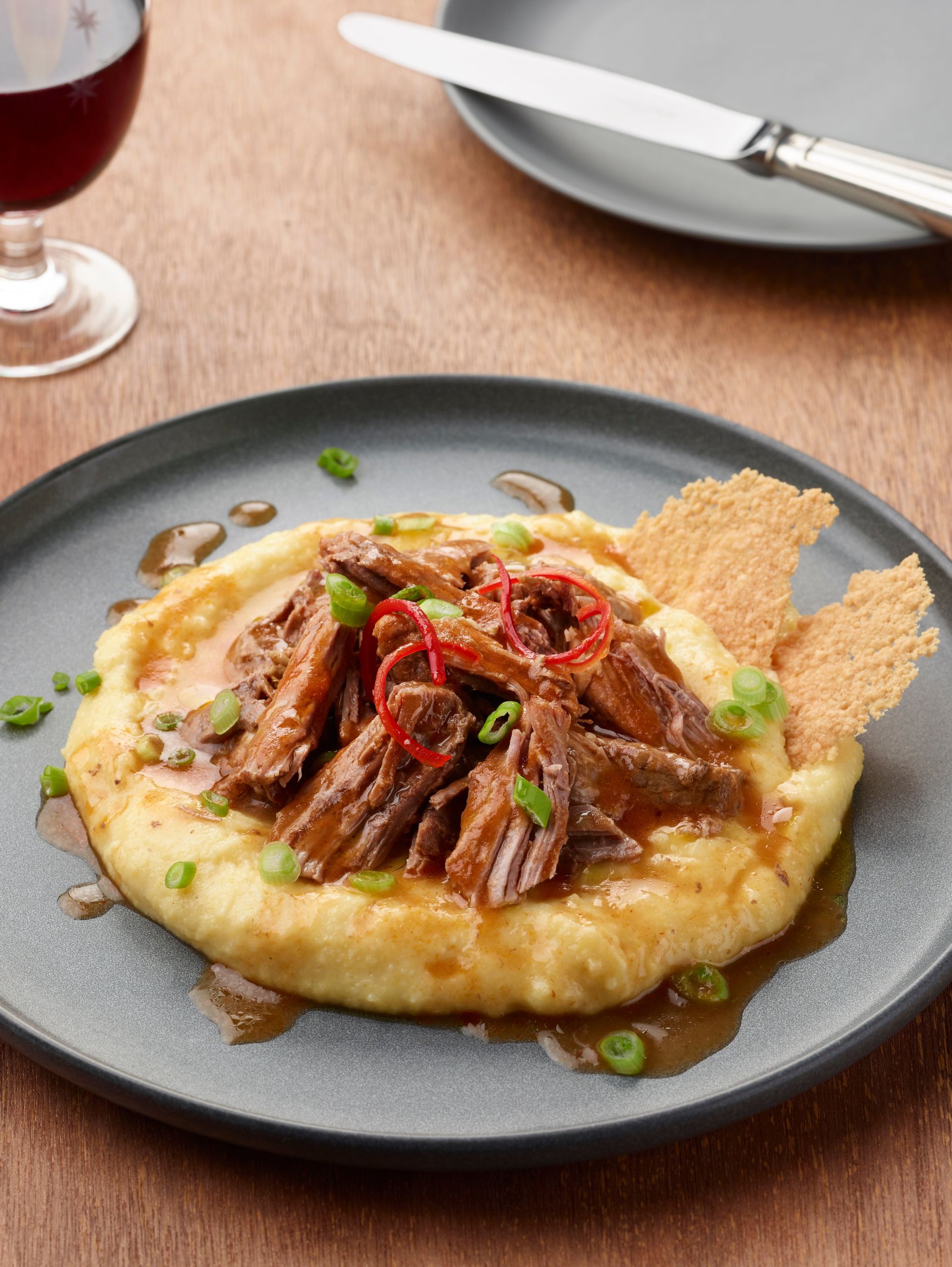 Parmesan braised Australian boneless lamb leg on polenta