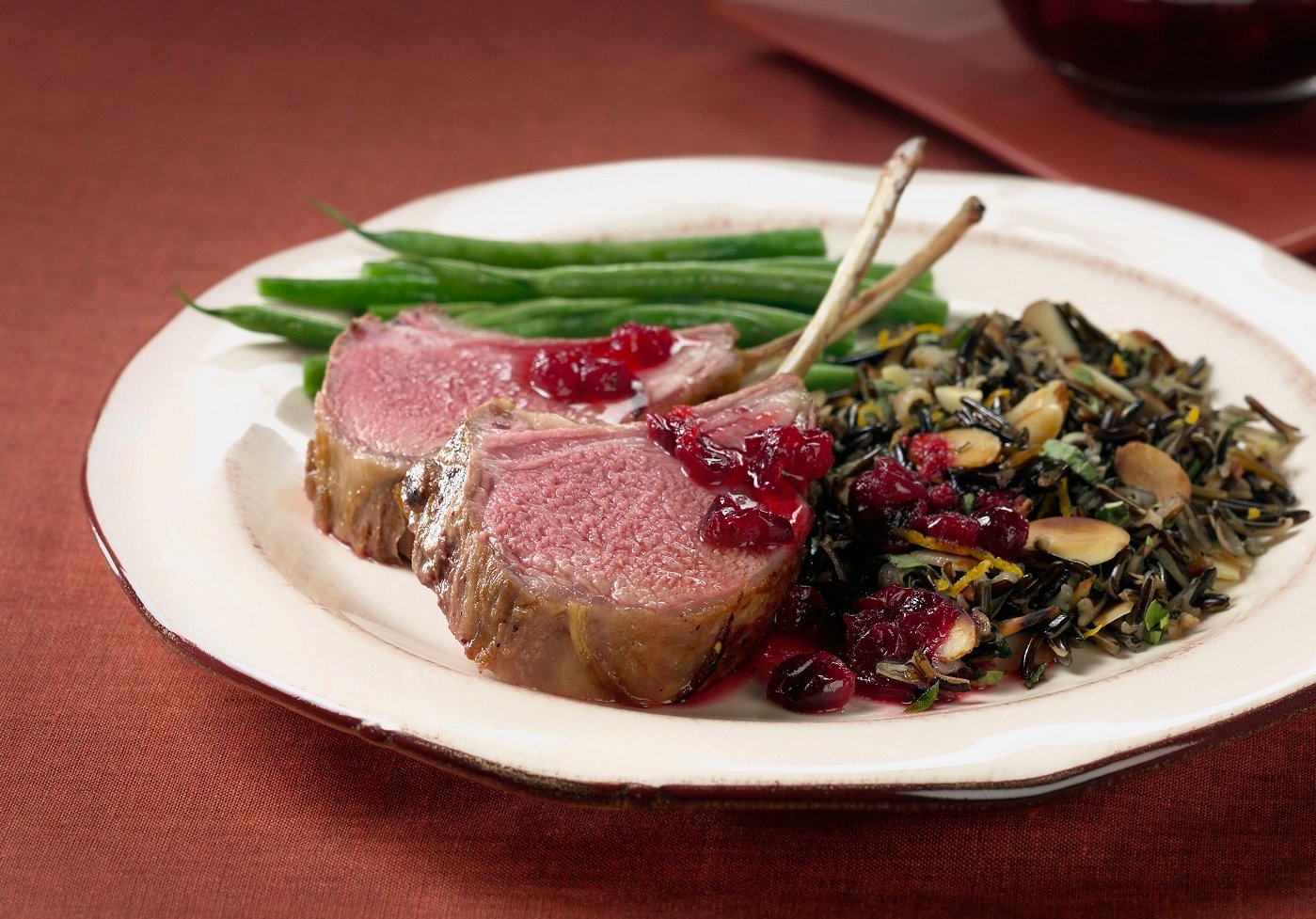 CRANBERRY-MARINATED RACK OF AUSTRALIAN LAMB WITH ALMOND WILD RICE