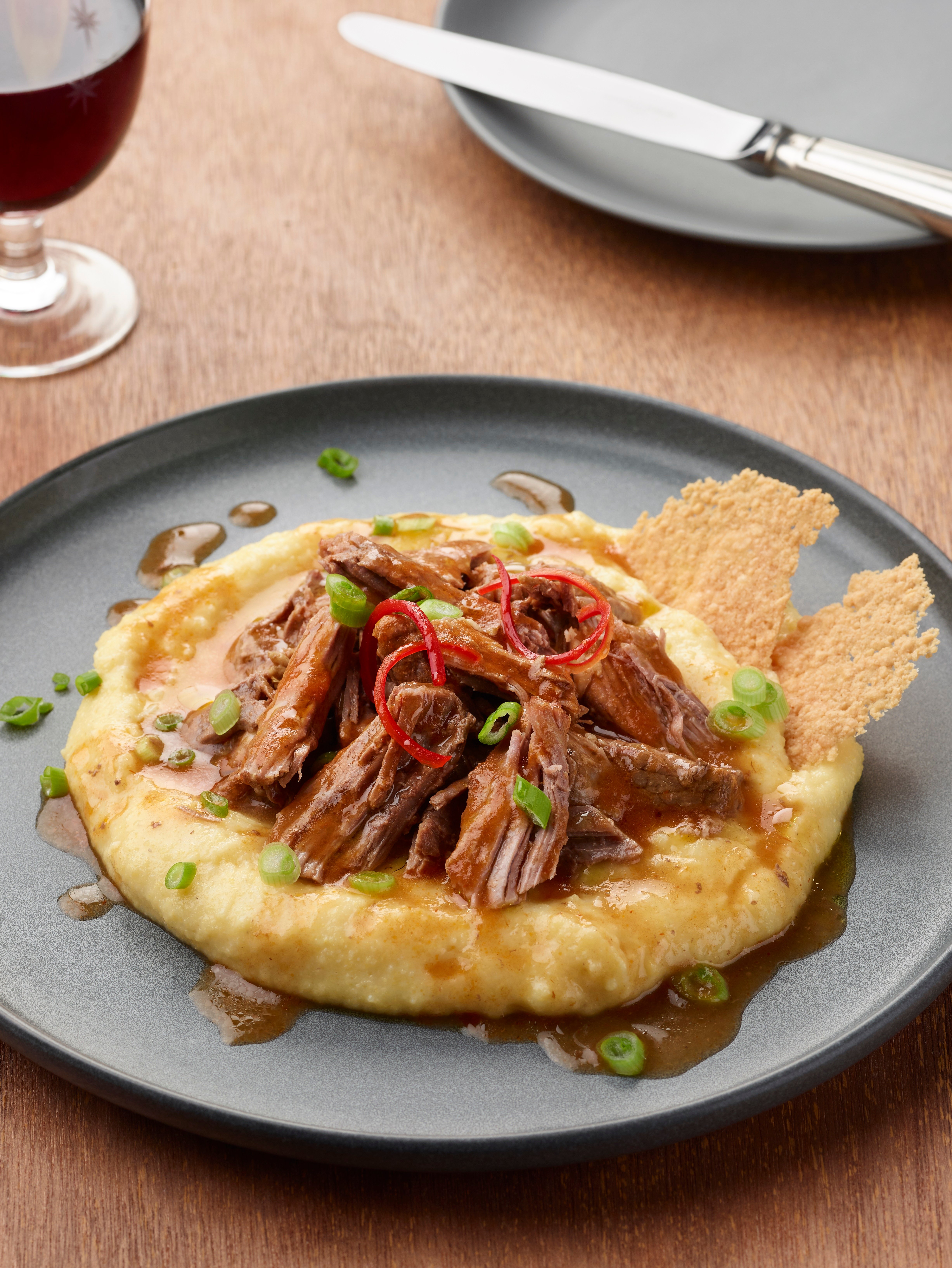 Easy Instant Pot Parmesan braised Australian boneless lamb leg on polenta