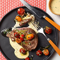 Grilled Aussie lamb shoulder chops with blistered cherry tomatoes and béarnaise