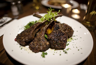 Grilled Australian herb and wattle seed crusted lamb lollies with caramelized pumpkin